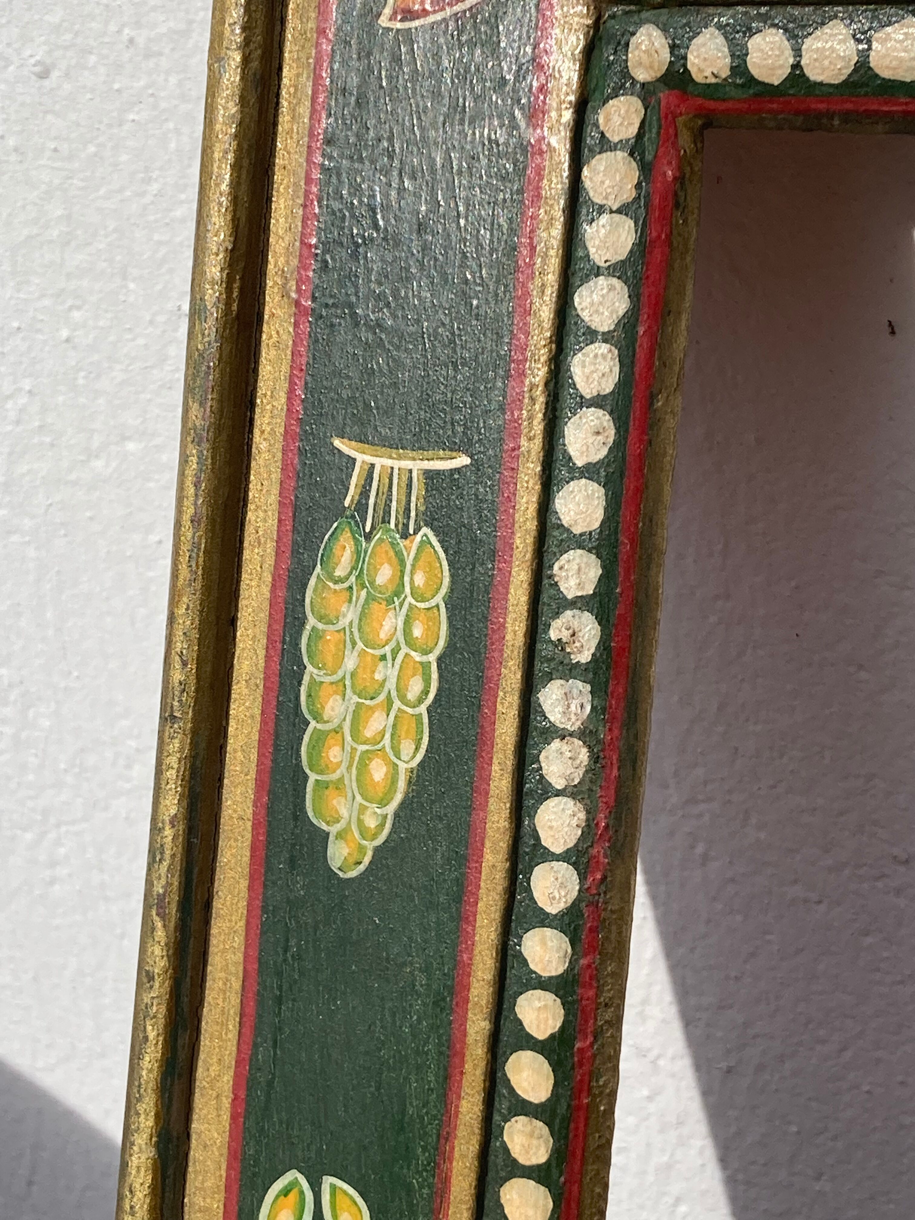 Hand-painted wooden frame with fruit decoration