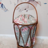 Standing worker in rattan and toile de Jouy style fabric