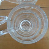 4 transparent glass mugs