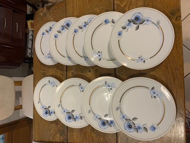 9 white porcelain plates of art deco blue flower limoges