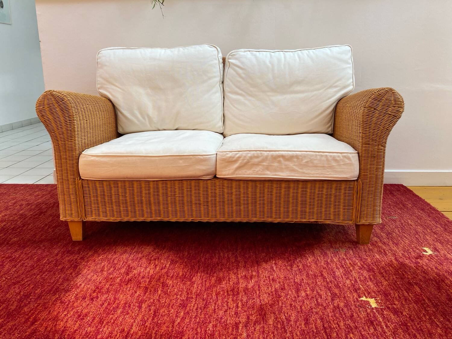 Antique 2-seater rattan sofa from the 70s