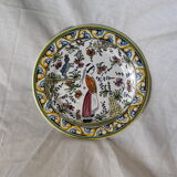 Decorative plate with medieval, Breton and rabbit decoration surrounded by plants - Breton earthenware