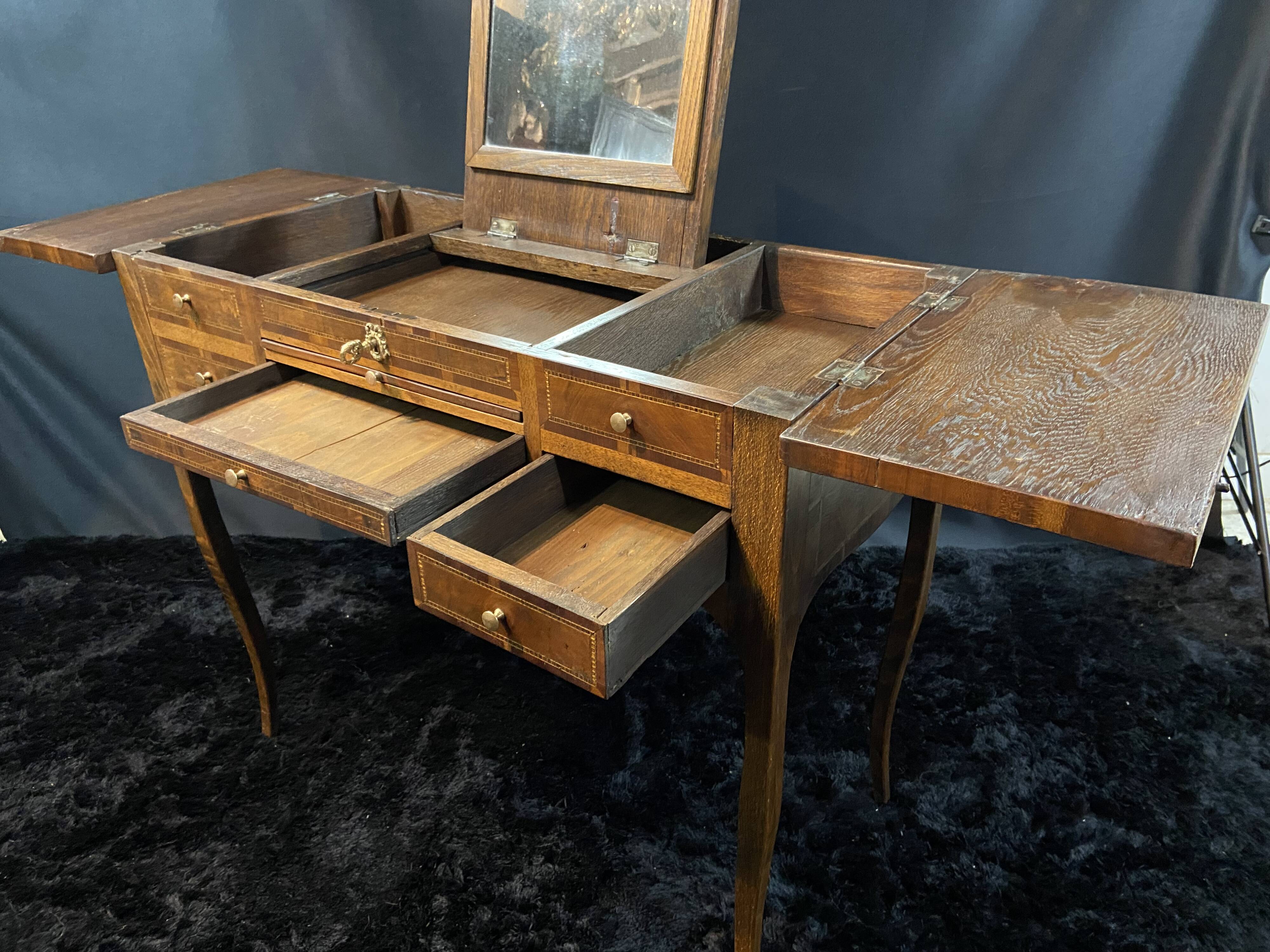 19th-century hairdresser with marquetry decoration on oak in the Louis XV Transition style.