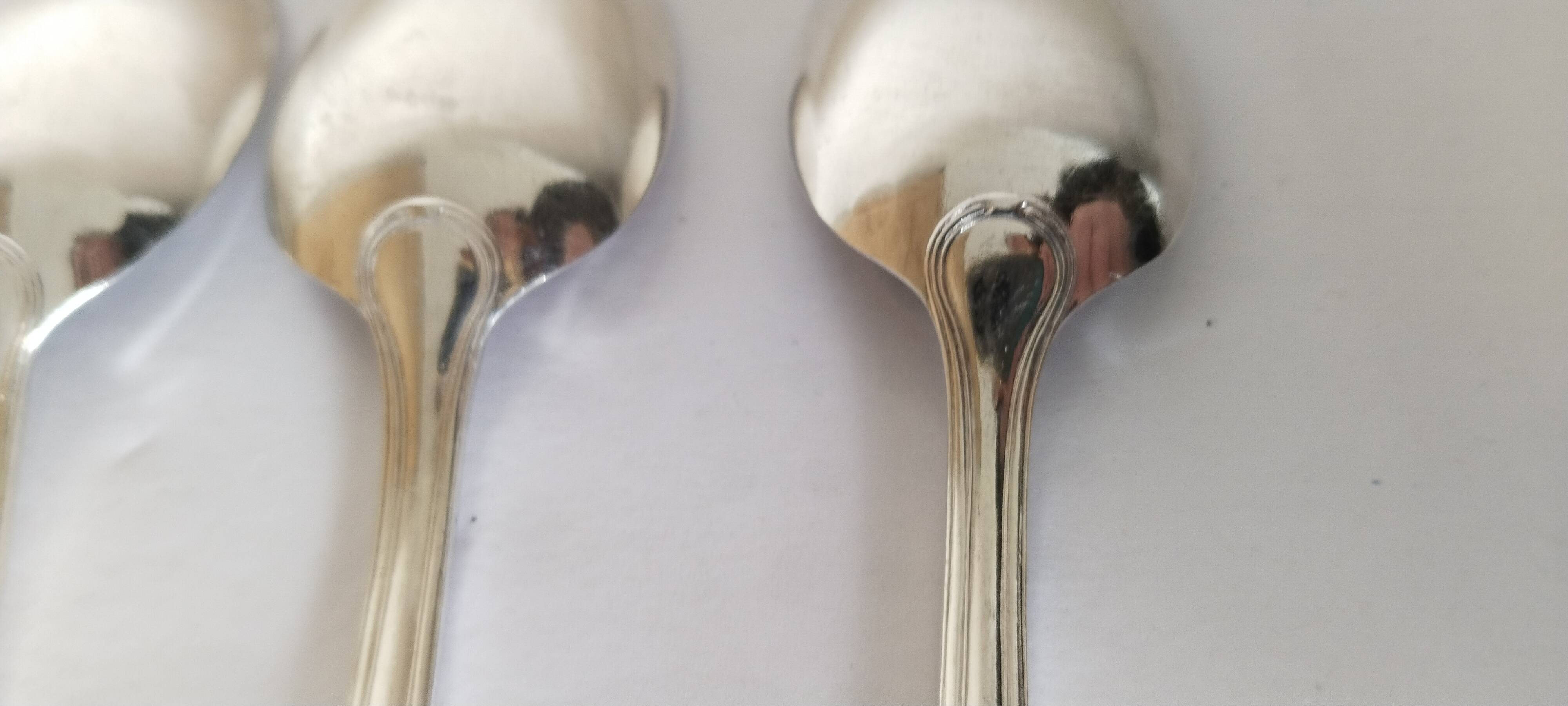 Dessert spoons, silver teaspoons