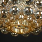 Large amber bubble glass pendant light by Helena Tynell for Limburg, Germany, 1970s.