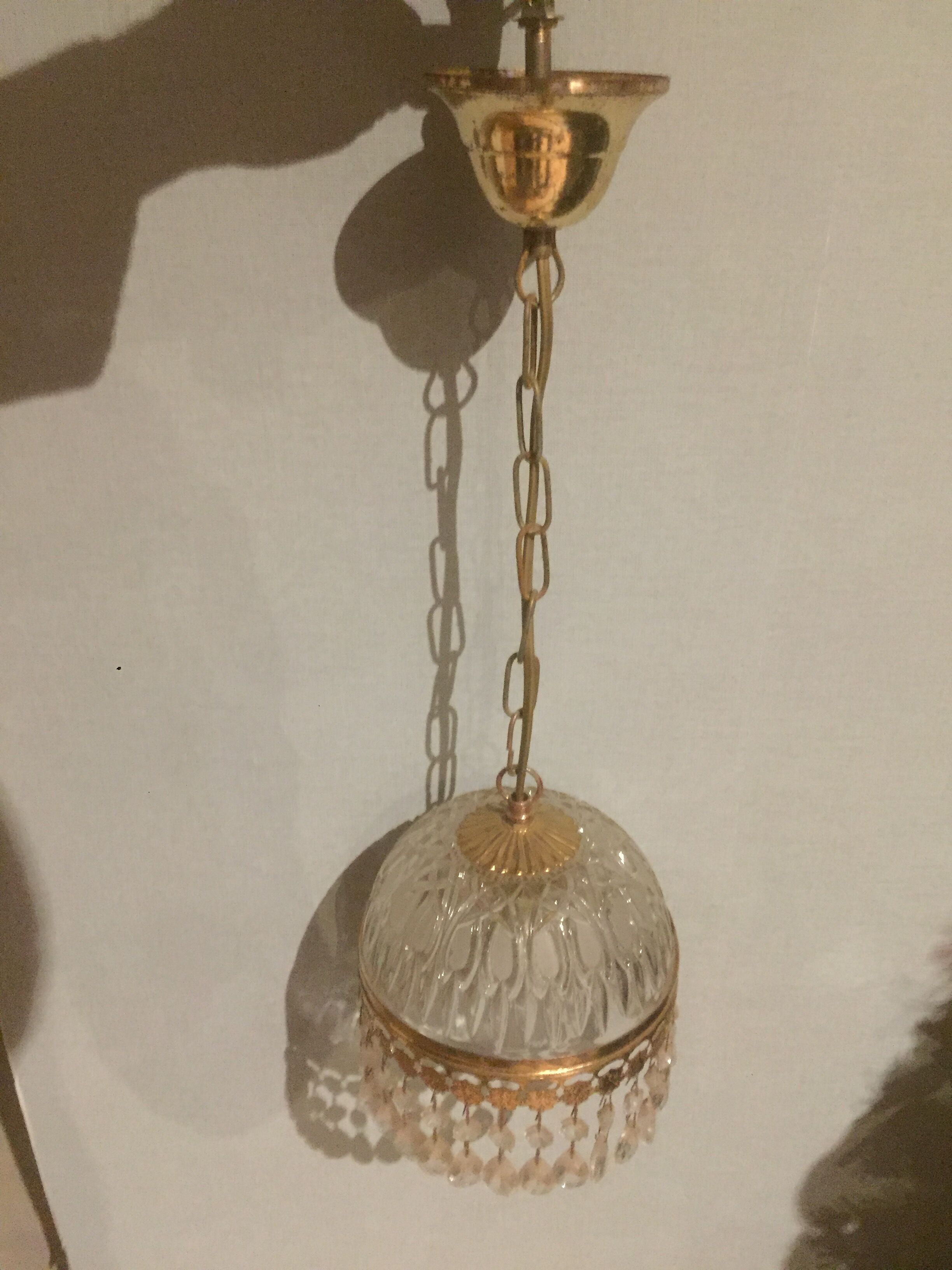 Hanging glass and stamps