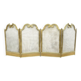 Antique brass fireplace screen from 1920, vintage spark guard.