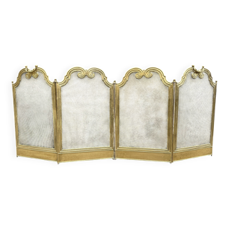 Antique brass fireplace screen from 1920, vintage spark guard.