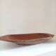 Oblong solid wood cup