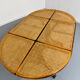 Vintage dining table with a cane top by Mundus from the 1970s.