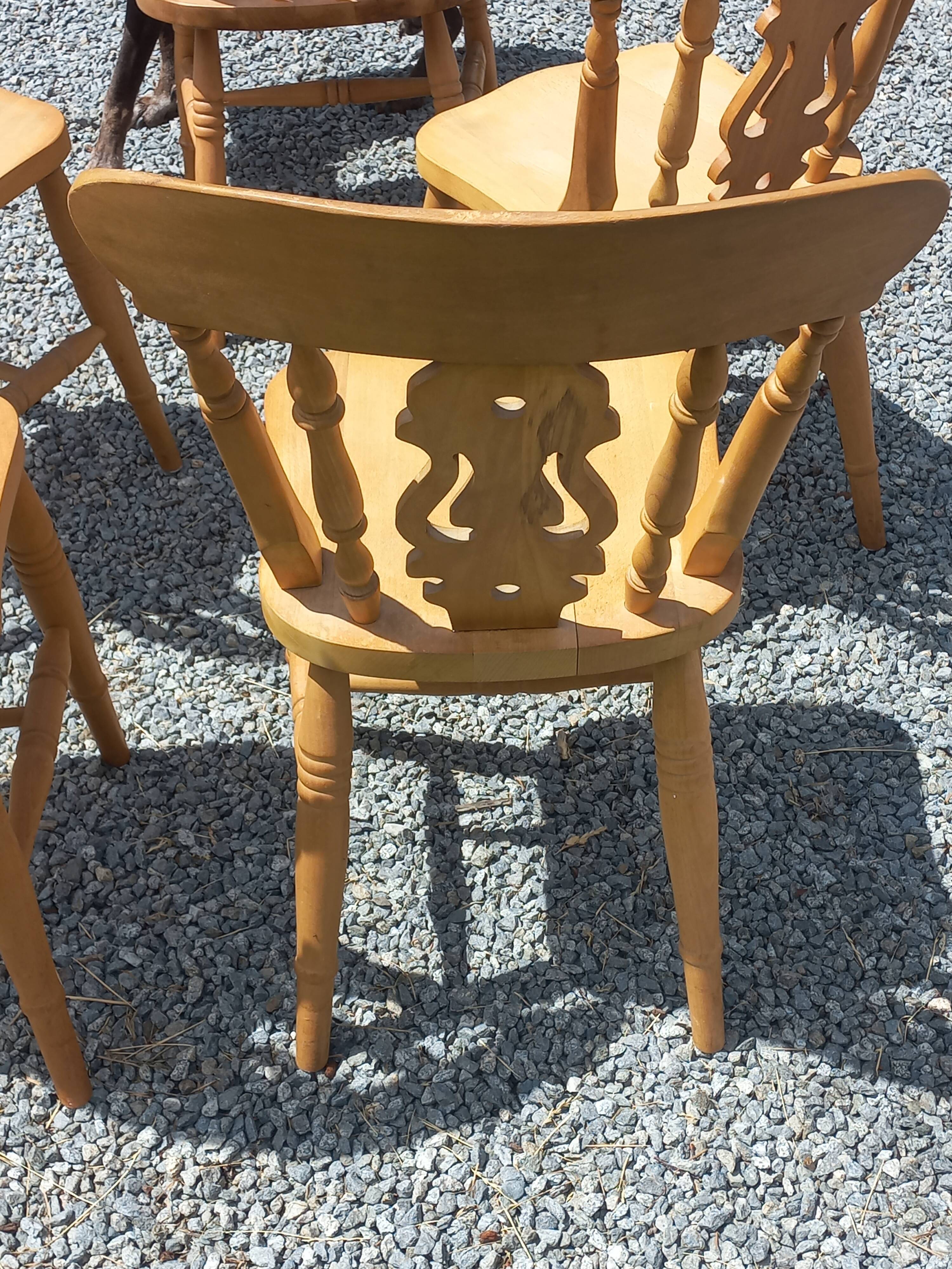 Set of 4 chairs and 1 armchair in mountain style.