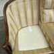 Two-seater Louis XVI canapé in golden beige fabric and curved solid wood.