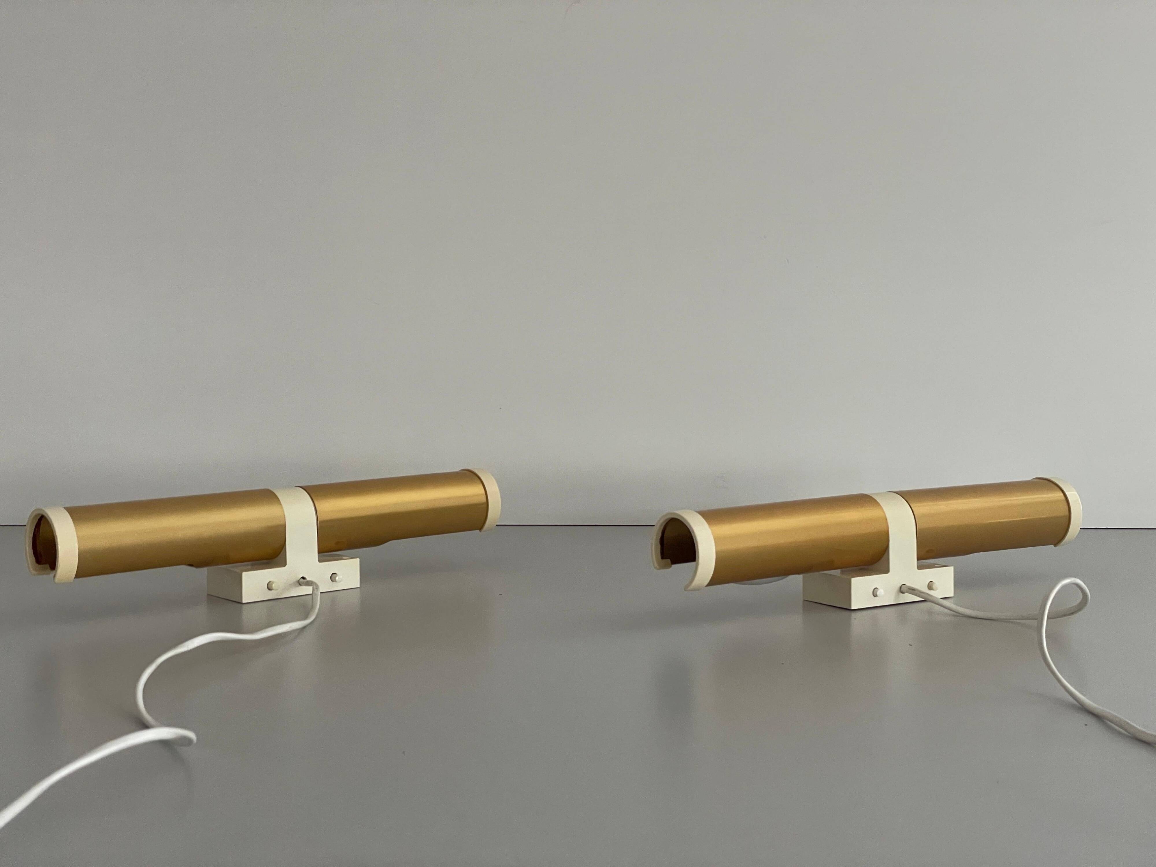 Pair of two-headed wall sconces in gold metal by ERCO, 1970s, Germany