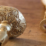 Pair of handmade candle holders, cast iron