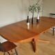 Walnut oval table with extension cords
