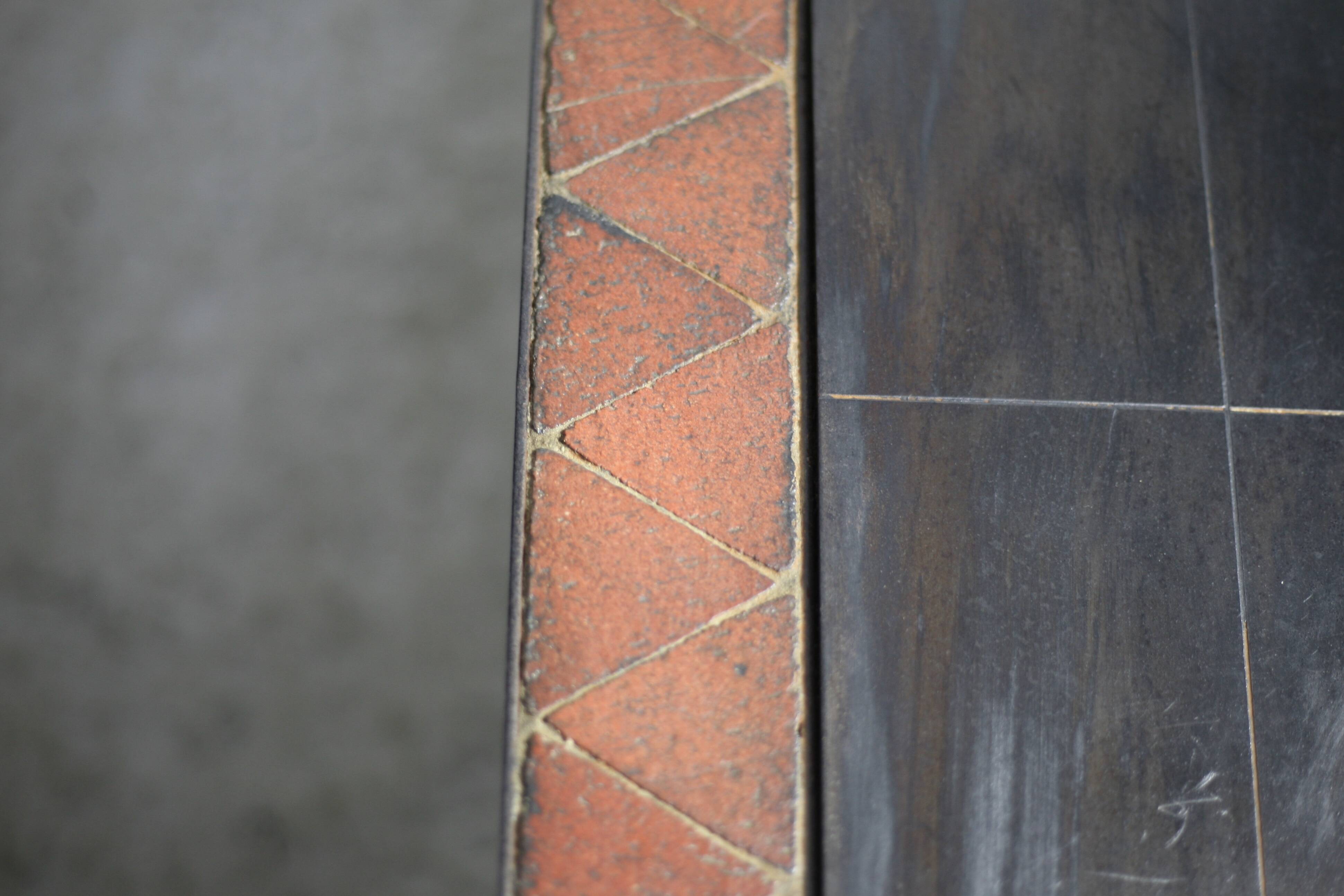 Coffee table, ceramic and steel plates, circa 1960.