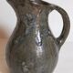 Potter's pitcher Art-popular in old enamelled earth