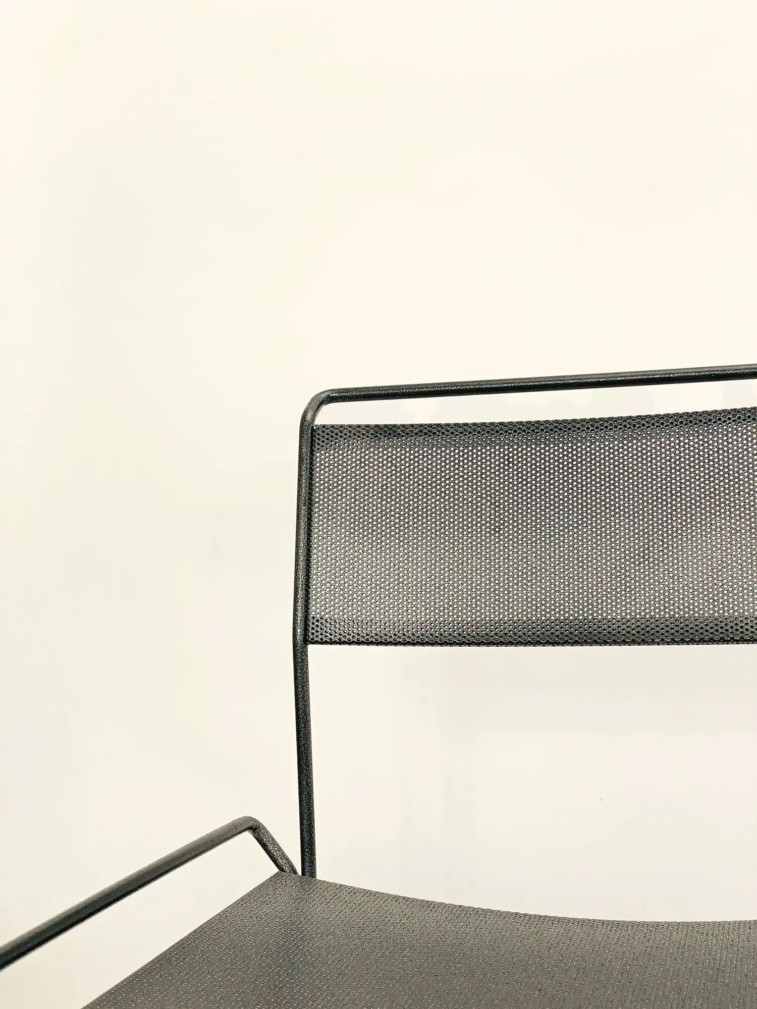 Perforated steel chairs