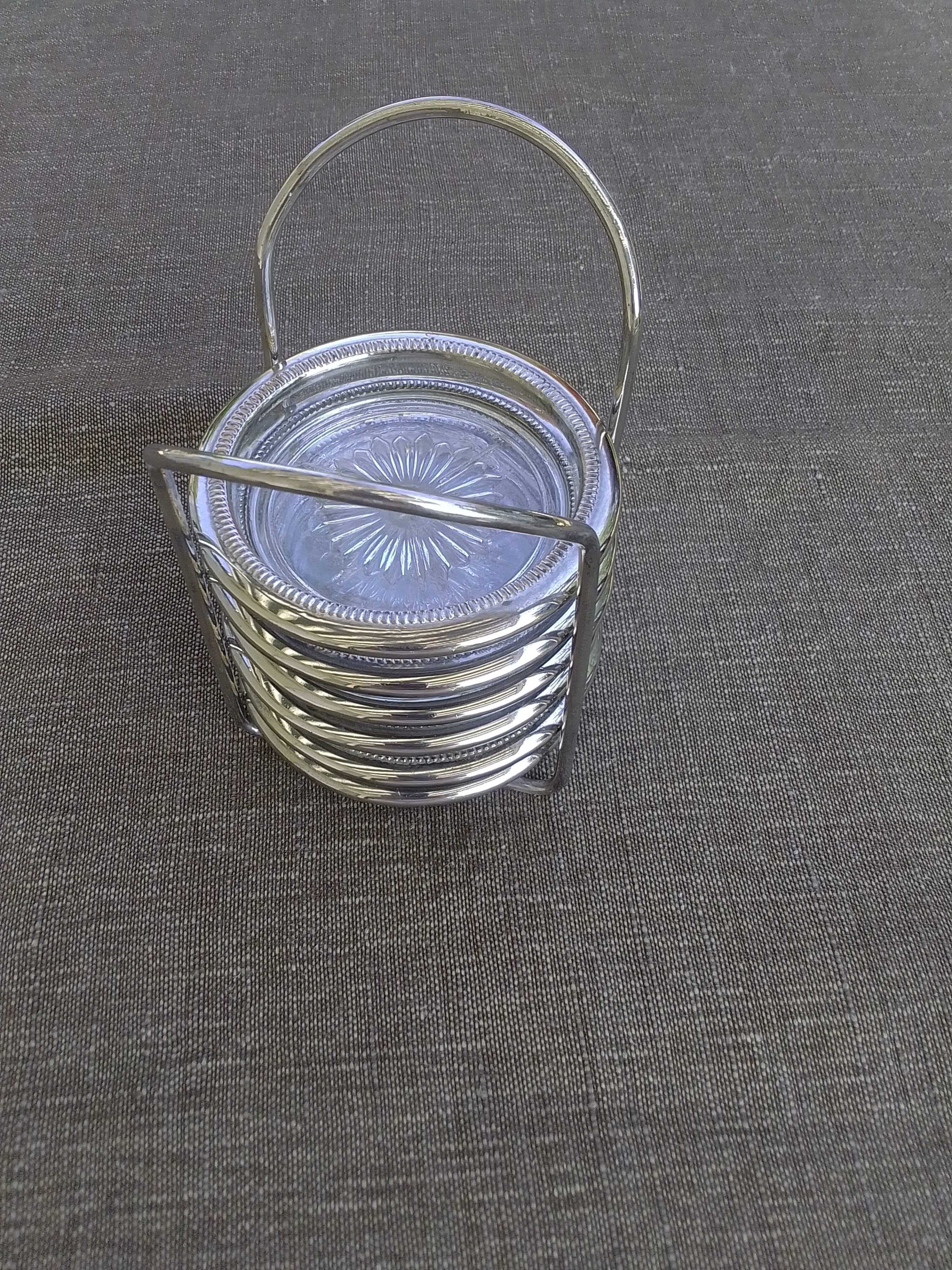 6 coasters and silver metal support
