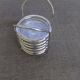 6 coasters and silver metal support