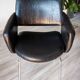Modernist armchair from the 50s-60s, chrome and faux leather.