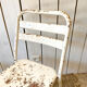 Pair of white metal bistro chairs