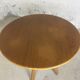 Wooden table and round rattan