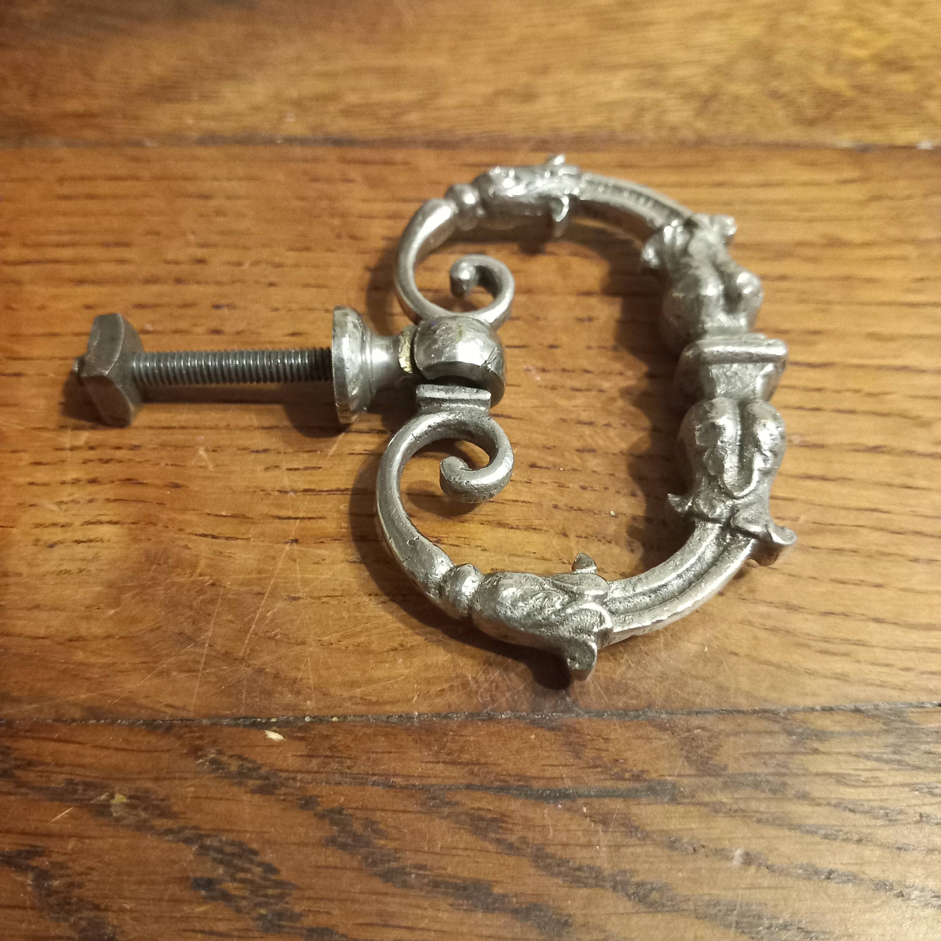 Old silver-plated metal furniture handle