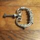 Old silver-plated metal furniture handle
