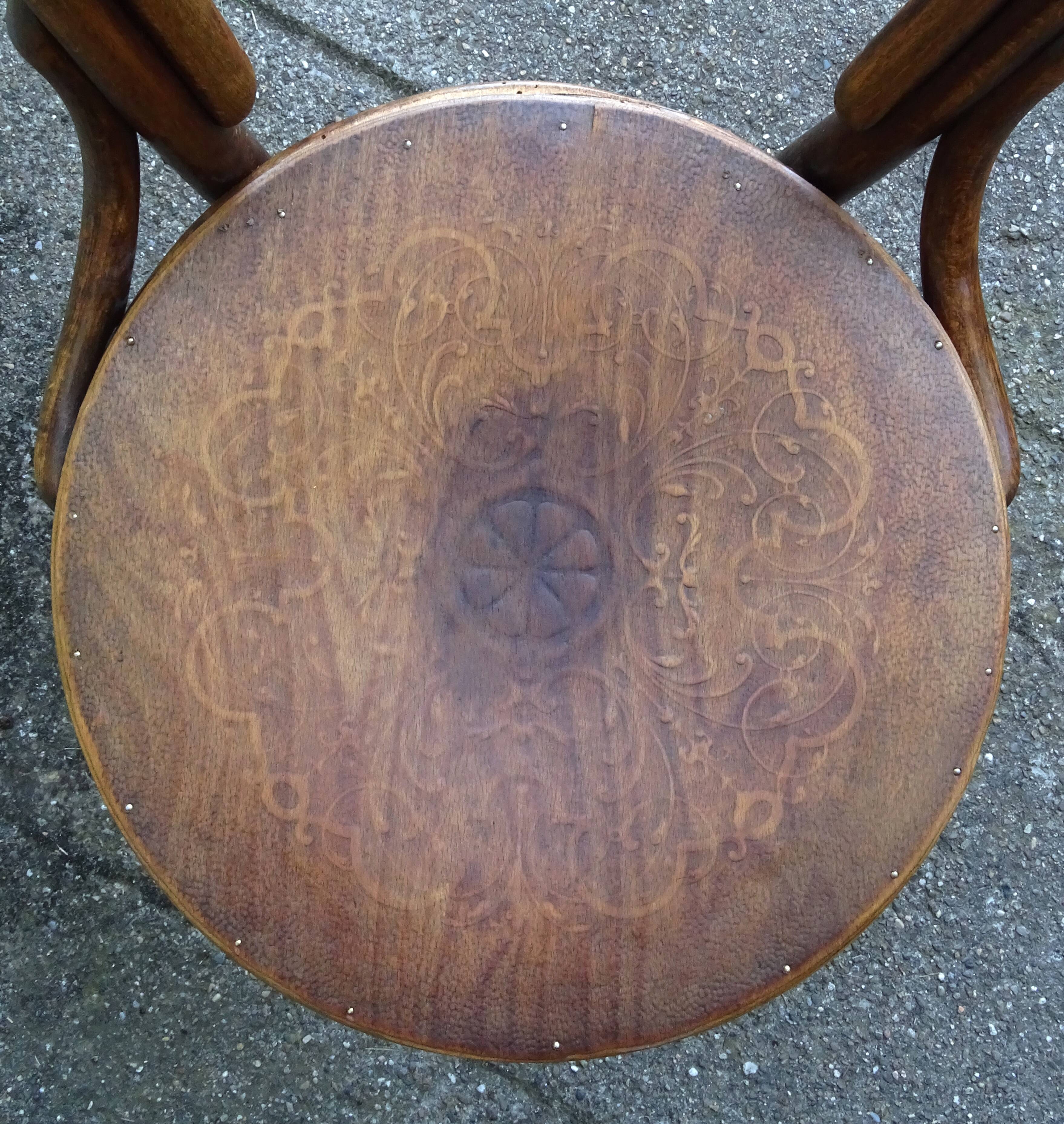 Set of 4 mismatched bistro chairs, 1900 to 1930 with wooden seats, Thonet, Baumann