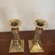 Pair of brass column candle holders