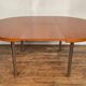 Round table with teak extension design Pierre Guariche edition Huchers Minvielle 1960
