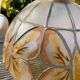 Suspension nacre et laiton papillons