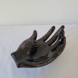 Empty pockets in the shape of a hand