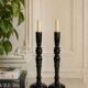 Pair of antique ebonised wooden candlesticks from the 19th century.