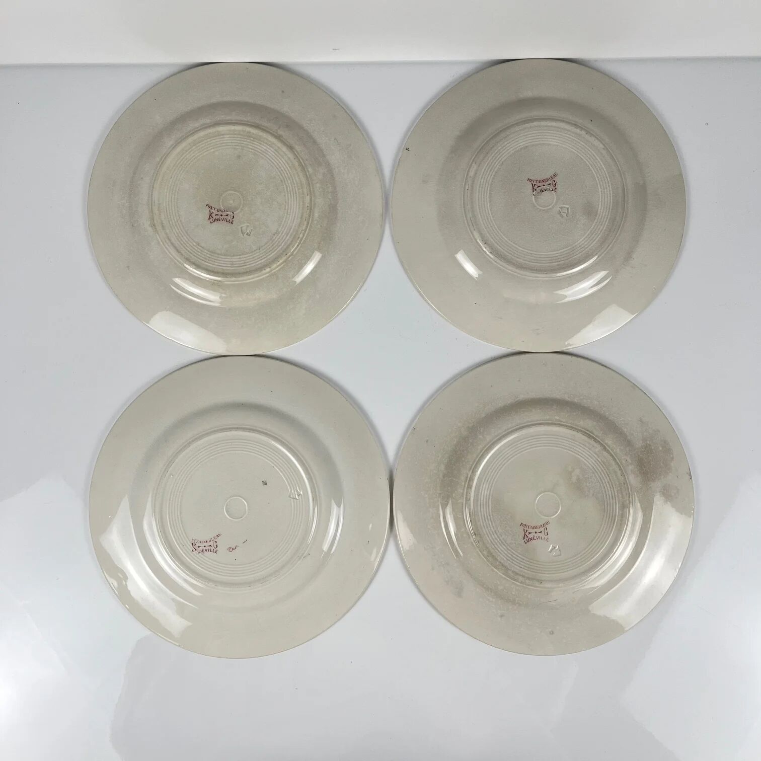 Set of 4 flat plates KG Lunéville Terre de fer, "Fontainebleau", pink, 19th century
