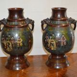 Asian vases in partitioned bronze