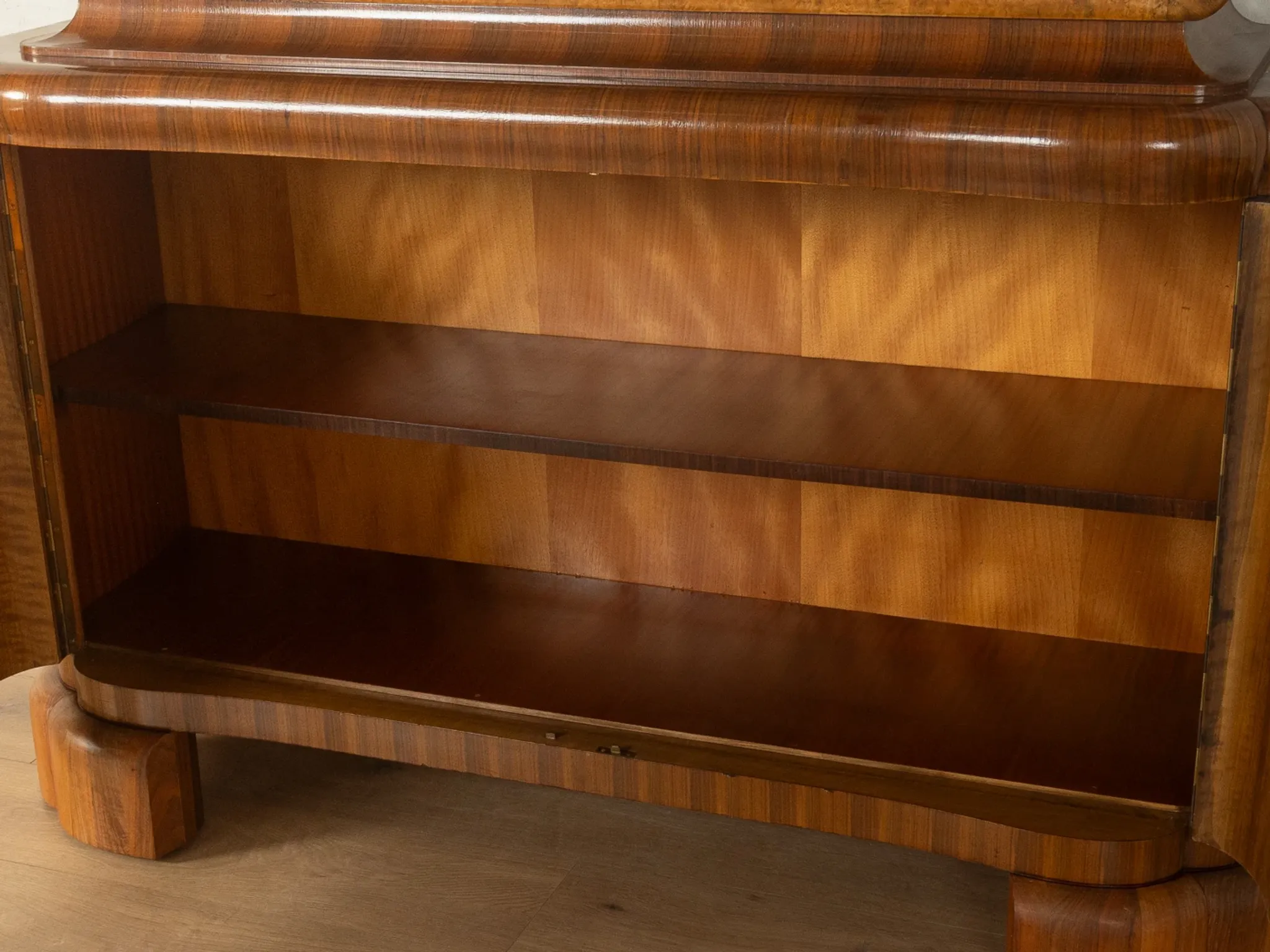 Classic two-piece Art Deco display cabinet from the 1930s with striking burl wood veneer