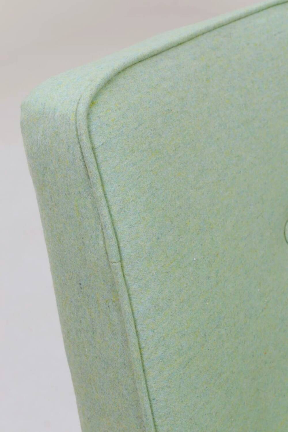 Pastel pistachio wool fabric Scandinavian armchair, oak wood.