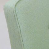 Pastel pistachio wool fabric Scandinavian armchair, oak wood.