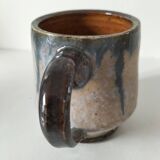 Fleur-de-lis glazed earthenware mug