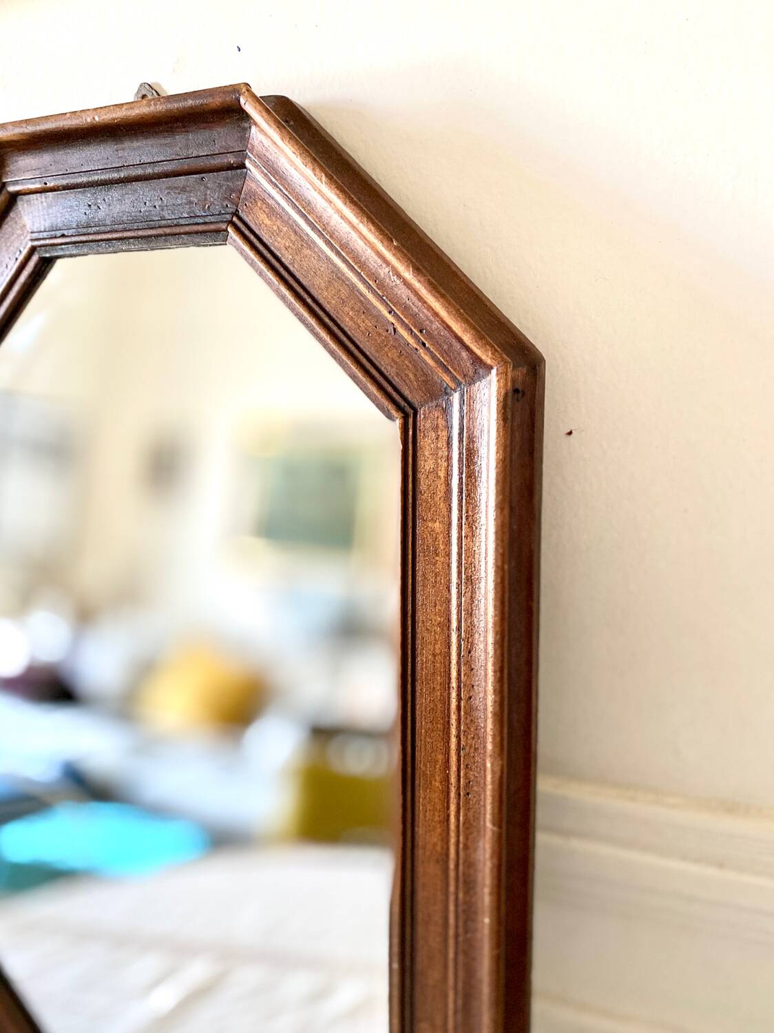 Vintage dark wood octagonal mirror