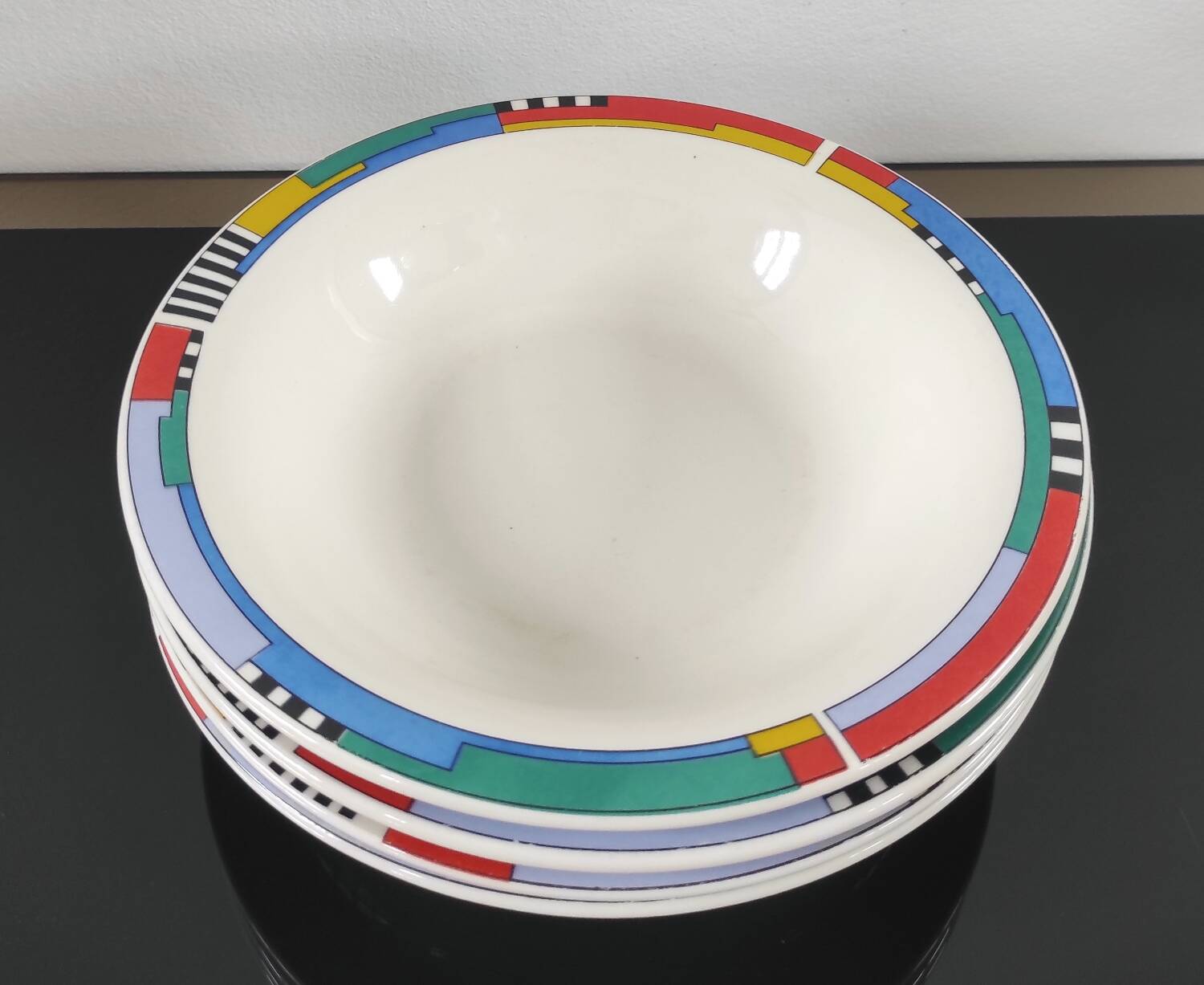Set of 4 vintage Memphis style deep plates.