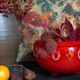 Vintage bright red enamel ceramic tripod vase