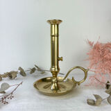 Brass candle holder with pusher late nineteenth century