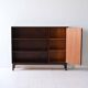 Vintage bookshelf with a door