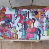 Curule stool in patinated carved wood, Manuel Canovas seat, 60 cm