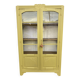 Antique yellow display cabinet