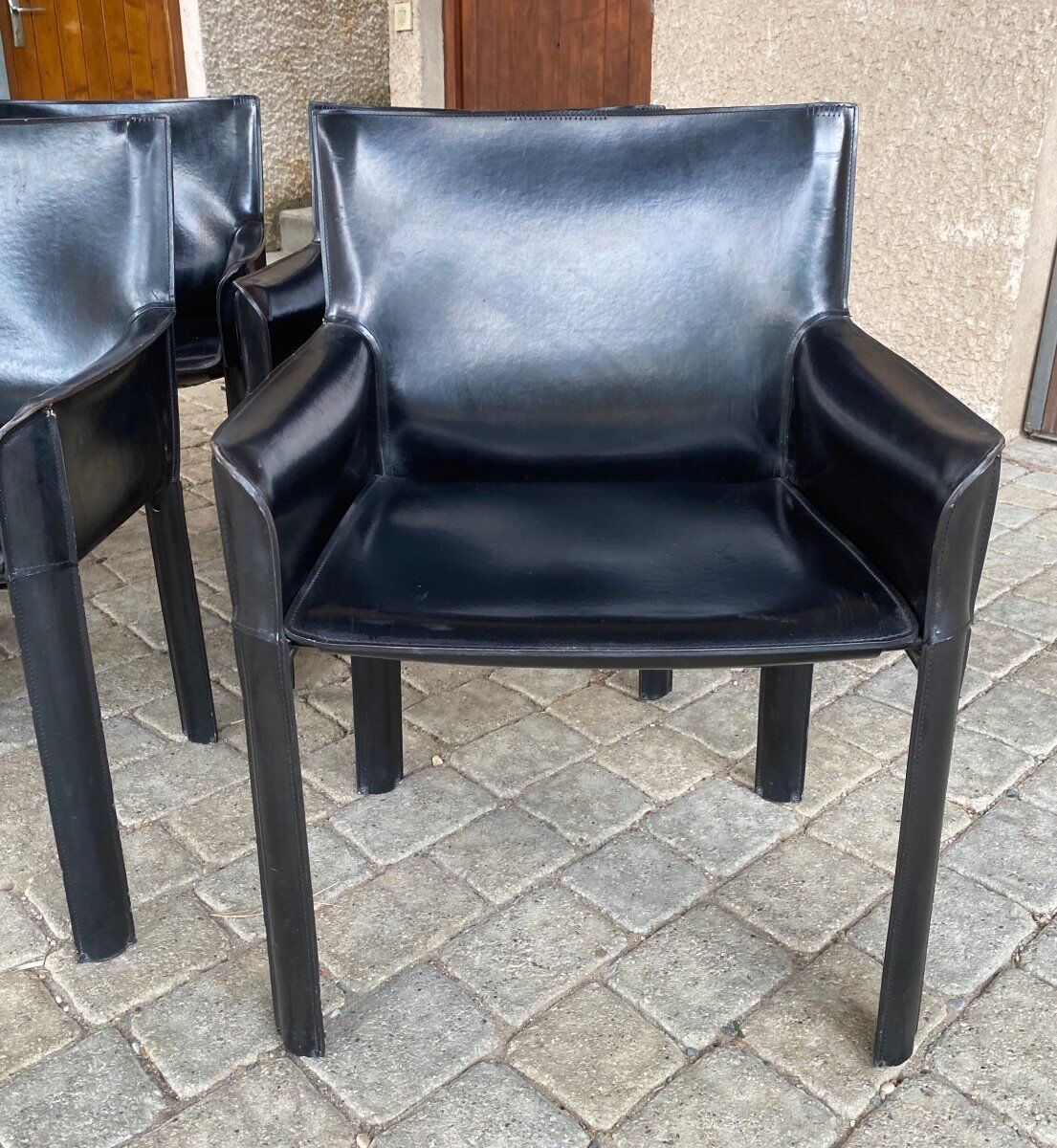 7 armchairs by Couro Brasil in Black Leather