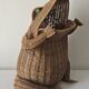 Vintage rattan frog magazine rack